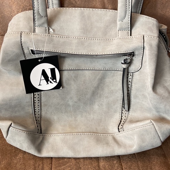 A&i Gray Vinyl Leather purse with multiple pockets. Polka dot lined interior. - Picture 2 of 4